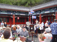 Guests have a rest in a coffee room under the Great Wall.